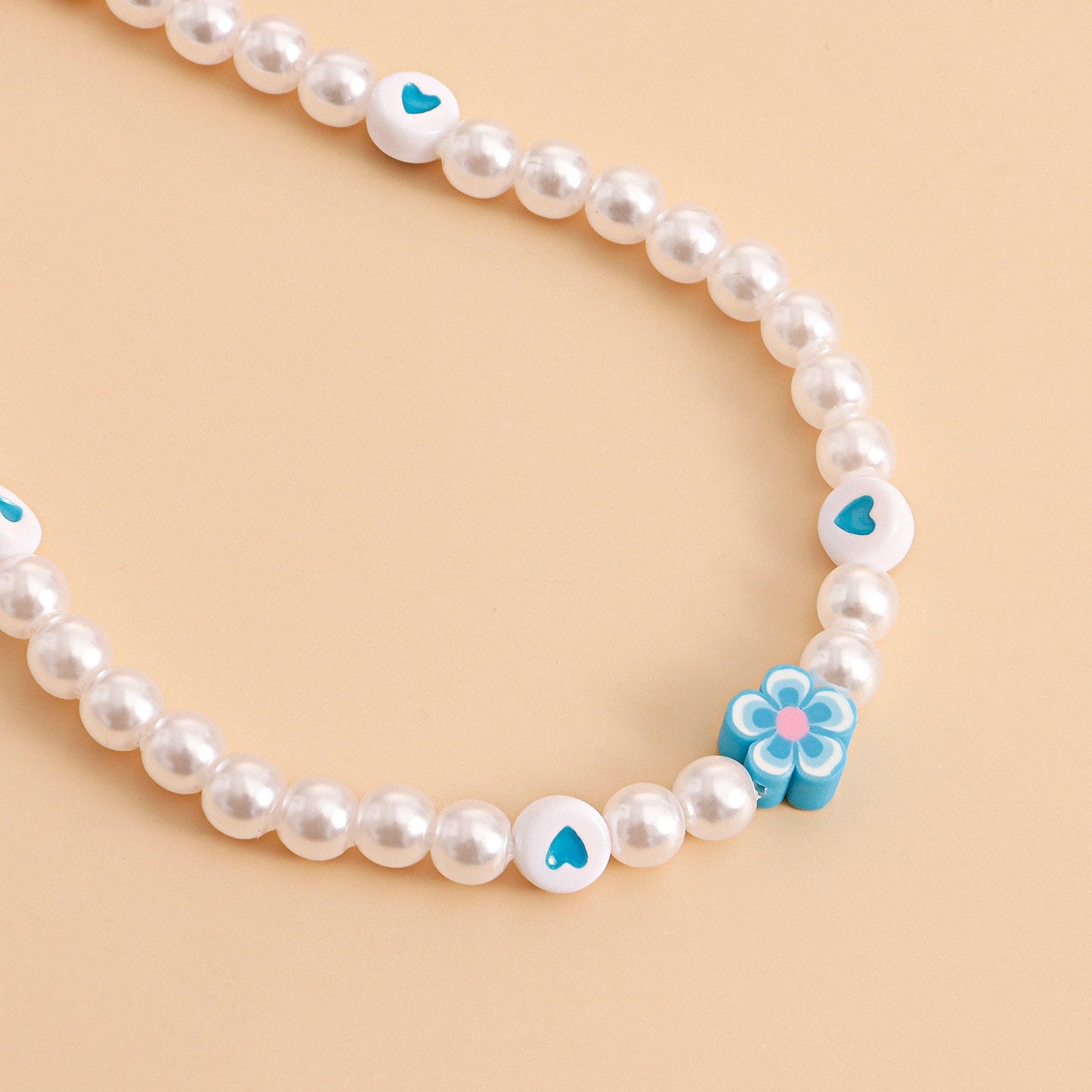 Jewelry ins soft pottery flower color love imitation pearl necklace female niche design light luxury