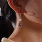 Fashion personality devil's eye palm pearl earrings women's hot style popular creative earrings