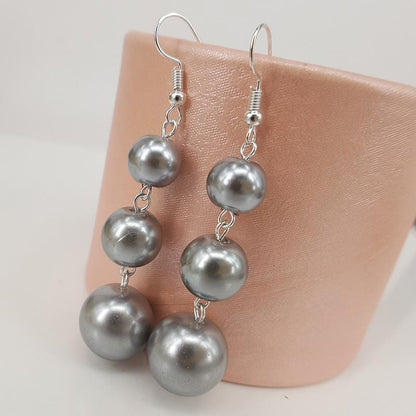The best taste in the world is Qinghuan's earrings of the same style Anqinghuan Chen Qiaoen's personality gray pearl earrings