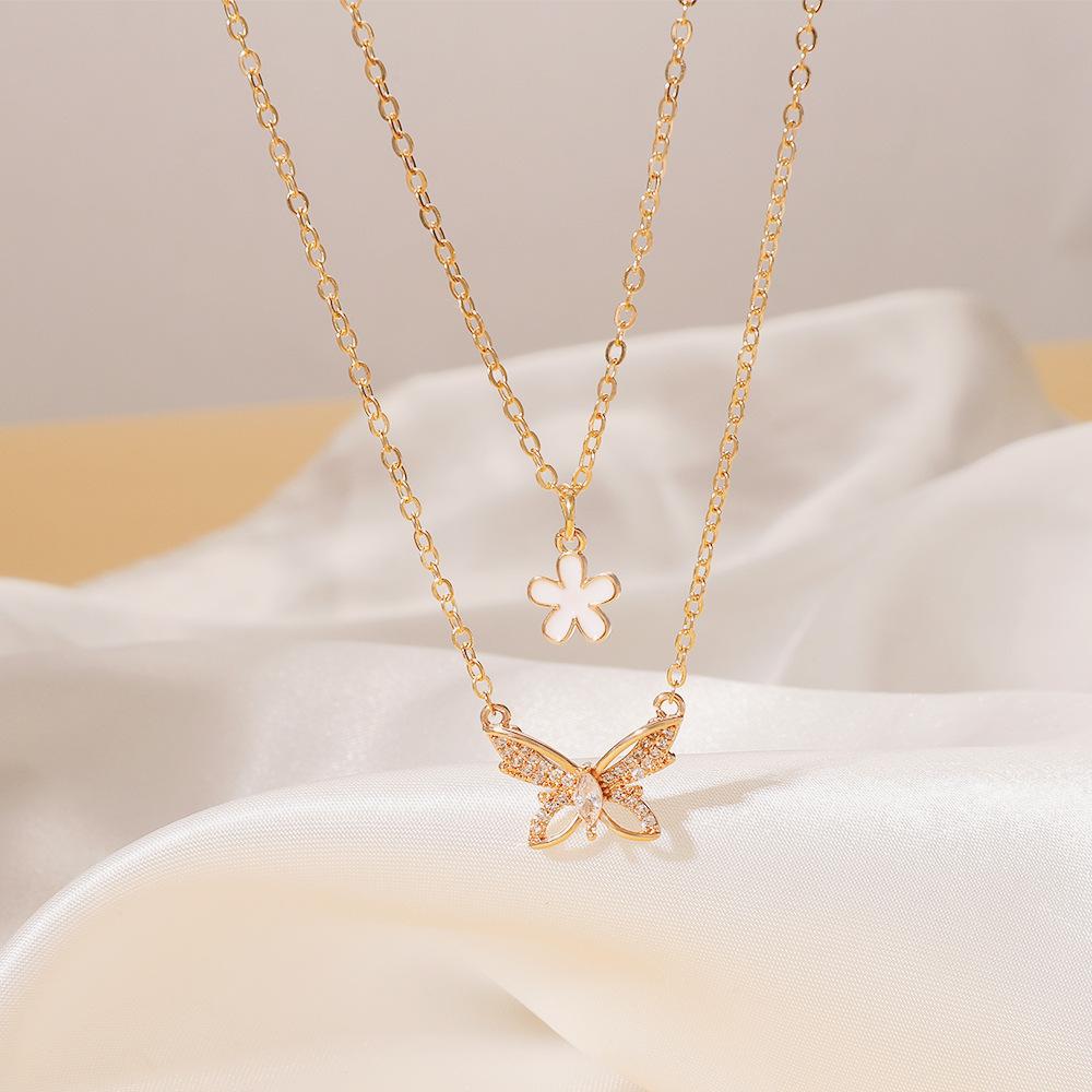 Ins stacked butterfly necklace female fashion niche design double flower pendant clavicle chain net red pendant