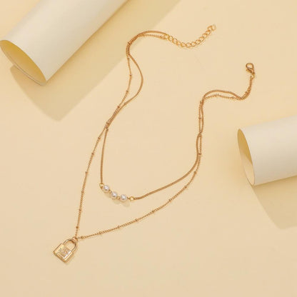 Dongdaemun Simple and Versatile Temperament Pearl Necklace Personality Metal Lock Pendant Fashion Niche Double Layer Necklace