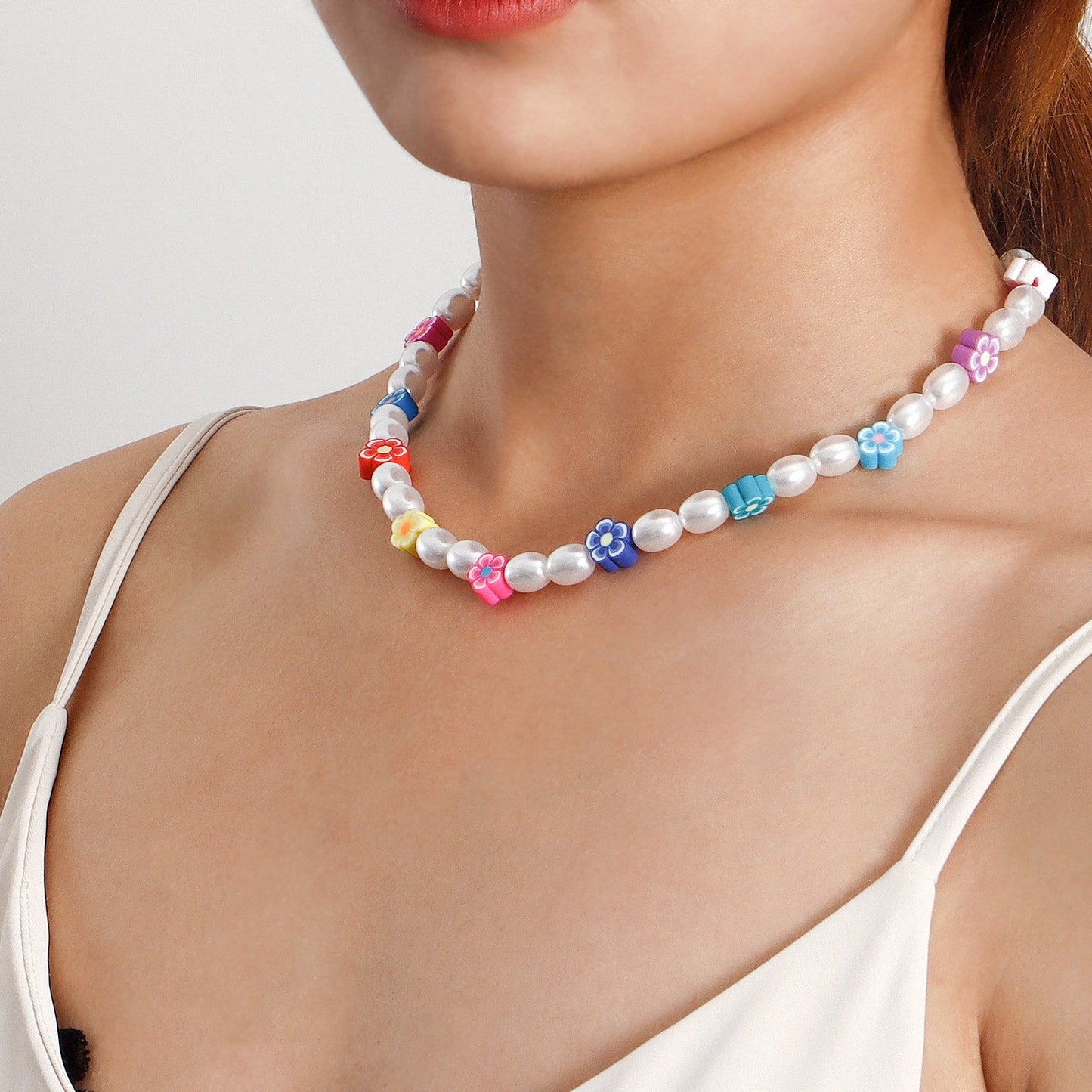 Jewelry acrylic pearl creative simple ladies necklace ins soft pottery flower pendant