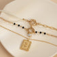 Fashion street shooting millet grain pearl ot buckle necklace female sweet cool metal rose tag pendant