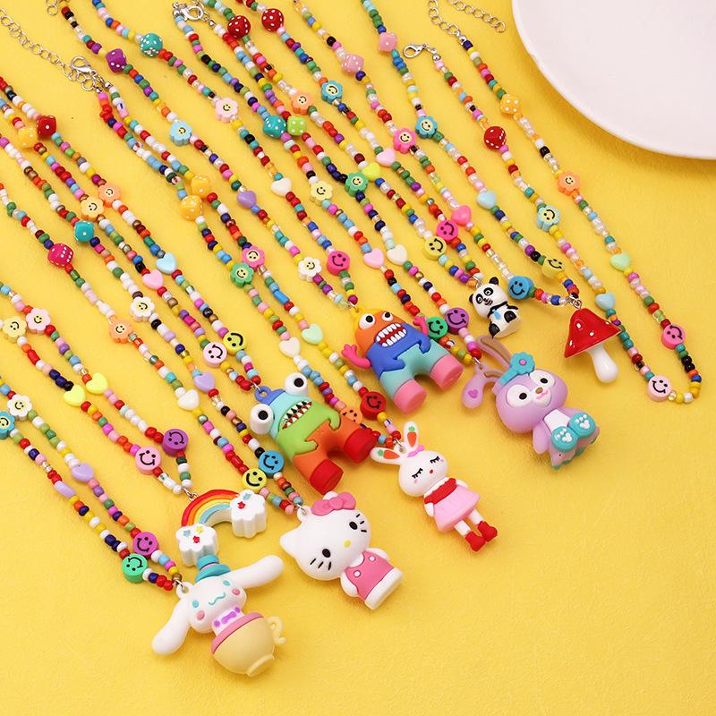 Ins niche design cartoon rainbow monster pendant rice bead necklace hip-hop all-match sweater chain trend style