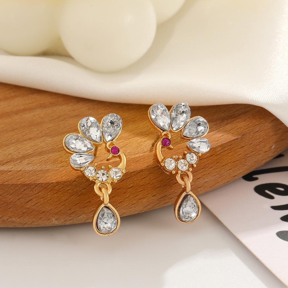 New Chinese style peacock earrings female retro fashion light luxury inlaid zircon phoenix earrings stud earrings national tide earrings