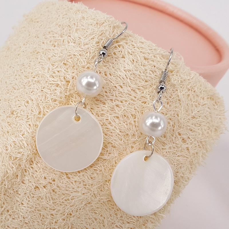 Natural round shell earrings simple pure handmade retro temperament female pearl earrings second hair Aqin same style