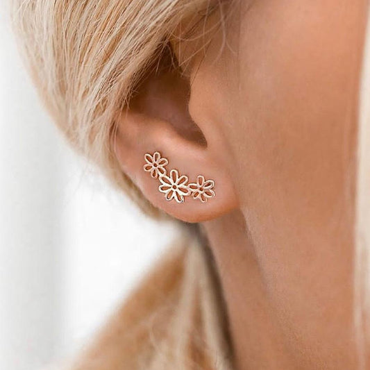 Simple flower earrings cold hollow small flower ear clip female small fresh all-match earrings