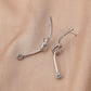 Diamond-encrusted earrings ins niche design creative knotted earrings simple temperament trendy ear accessories