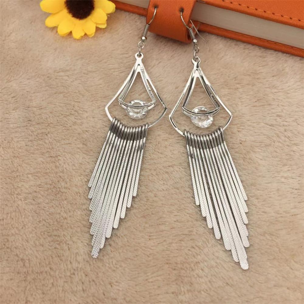 Big water drop clip diamond earrings women's long dot pattern metal strip tassel earrings minority popular jewelry