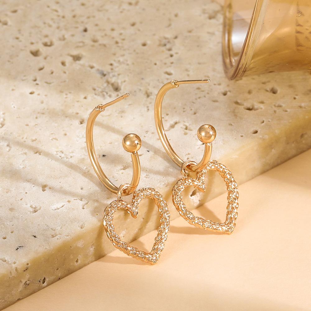 Hollow love earrings women's retro metal geometric heart-shaped earrings earhook ins net red earrings fashion