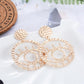 Exaggerated personality, hollow outline, eye earrings, earrings, female non-mainstream street photography, fun and exaggerated earrings