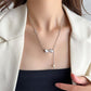 Diamond-encrusted pearl bow tassel necklace female niche design ins sexy clavicle chain simple light luxury net red