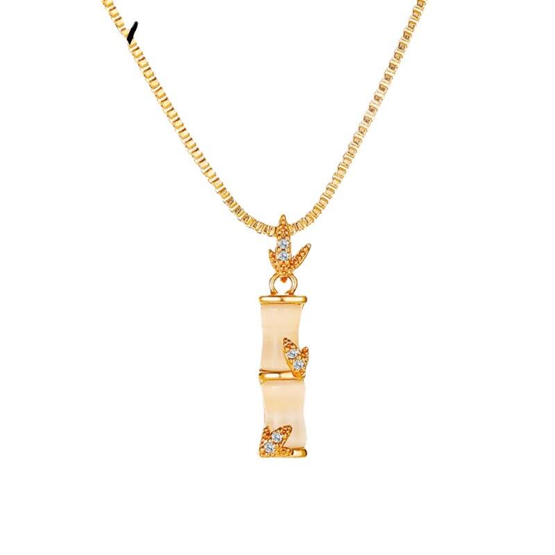 Temperament cat's eye carnation necklace female niche design exquisite bamboo pendant clavicle chain creative stall accessories