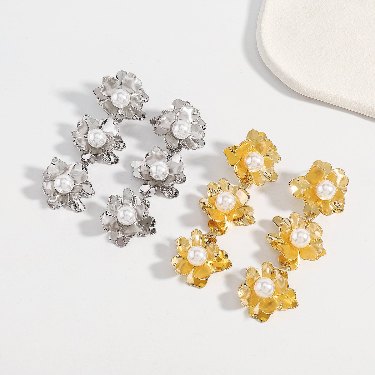 E118 Simple three-dimensional metal flower earrings cold design pearl long temperament earrings