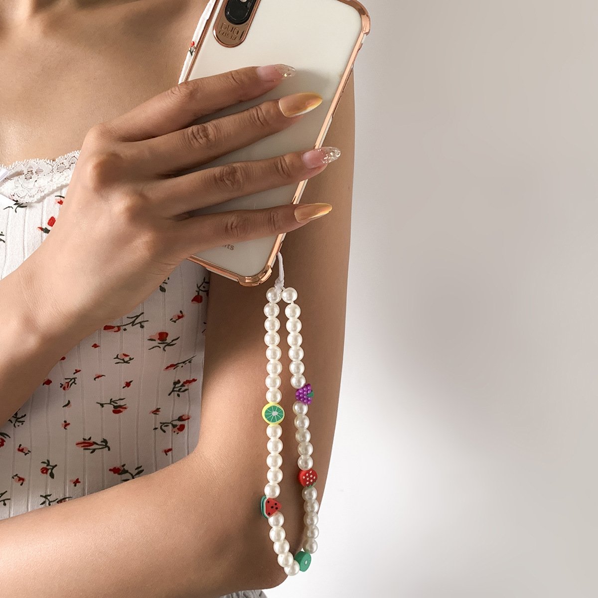 Jewelry Bohemian holiday imitation pearl fruit mobile phone chain sweet and cool temperament soft pottery accessories