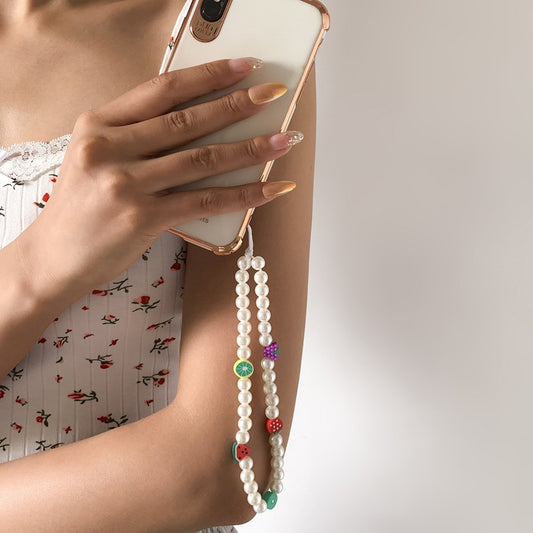 Jewelry Bohemian holiday imitation pearl fruit mobile phone chain sweet and cool temperament soft pottery accessories