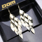 Atmospheric ethnic long string leaf-shaped brushed metal earrings