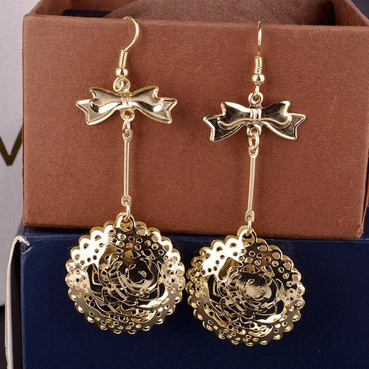 Three-dimensional Hollow Round Body Alloy Earrings Ladies Bow Knot Earrings