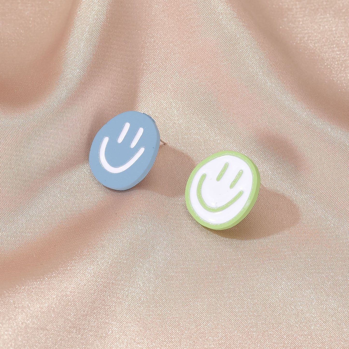 Sweet and cute round asymmetric smile earrings female ins fashion simple personality trend smile earrings