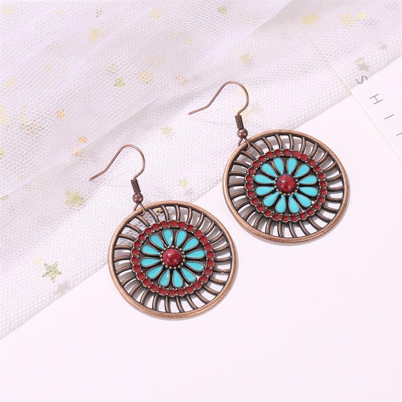 Ethnic personality earrings creative round hollow earrings female bohemian fashion retro flower earrings