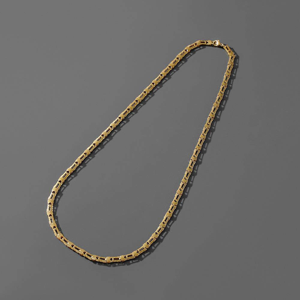 Trendy and fashionable men's stainless steel special-shaped hollow heart-shaped necklace titanium steel long section simple personality couple necklace