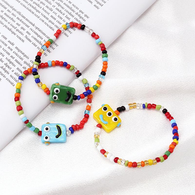 Cartoon little monster color beaded ceramic bracelet female niche design net red bracelet ins tide does not fade jewelry