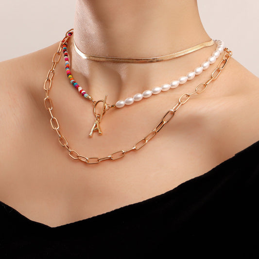 Accessories Bohemian imitation pearl rice bead fish line hand-woven necklace female flat snake chain ins