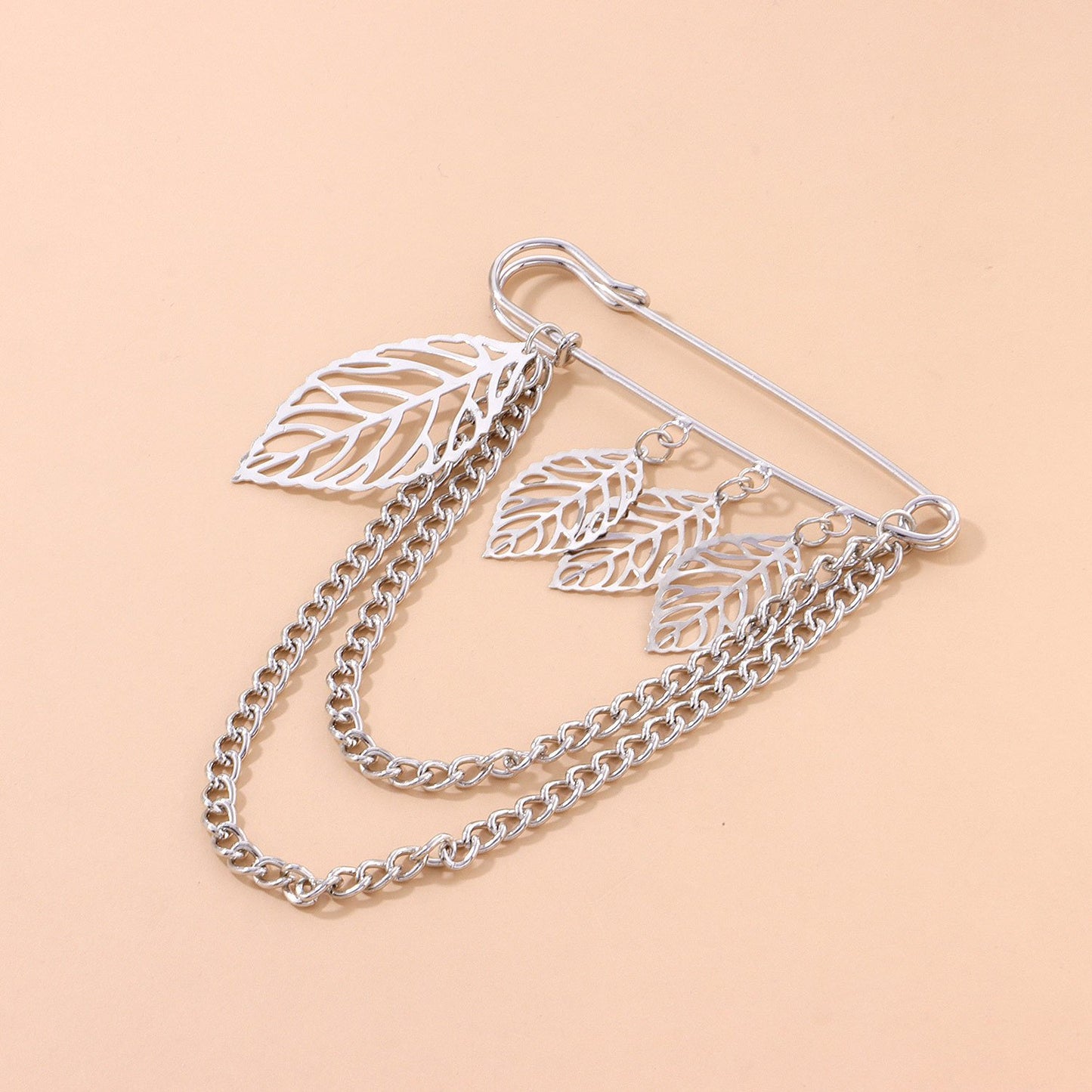 Jewelry Temperament Light Luxury Hollow Leaf Brooch Female Retro Trend Metal Chain Pin Accessories
