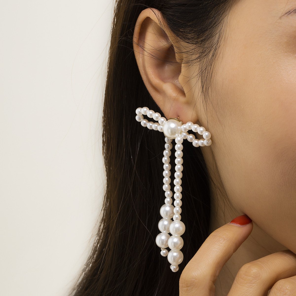 Jewelry simple and versatile pearl bow earrings temperament small fresh beaded tassel earrings for women
