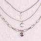 Multi-layer jewelry trend cross moon peach heart decoration ins hip-hop jumping disco necklace