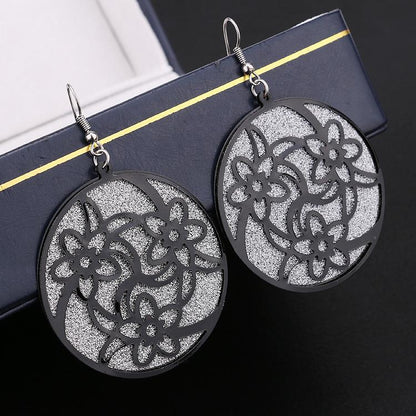 Popular element star with the same round swirling pattern swing earrings fashion frosted earrings direct supply