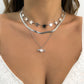 Hip-hop metal tassel star-shaped stacked retro collarbone chain niche simple angel pendant all-match snake bone chain necklace