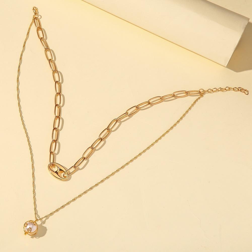 Personalized pig nose collarbone necklace fashion double temperament pearl hollow metal necklace