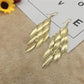 Atmospheric ethnic long string leaf-shaped metal frosted earrings earrings