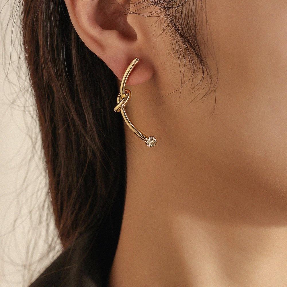 Diamond-encrusted earrings ins niche design creative knotted earrings simple temperament trendy ear accessories