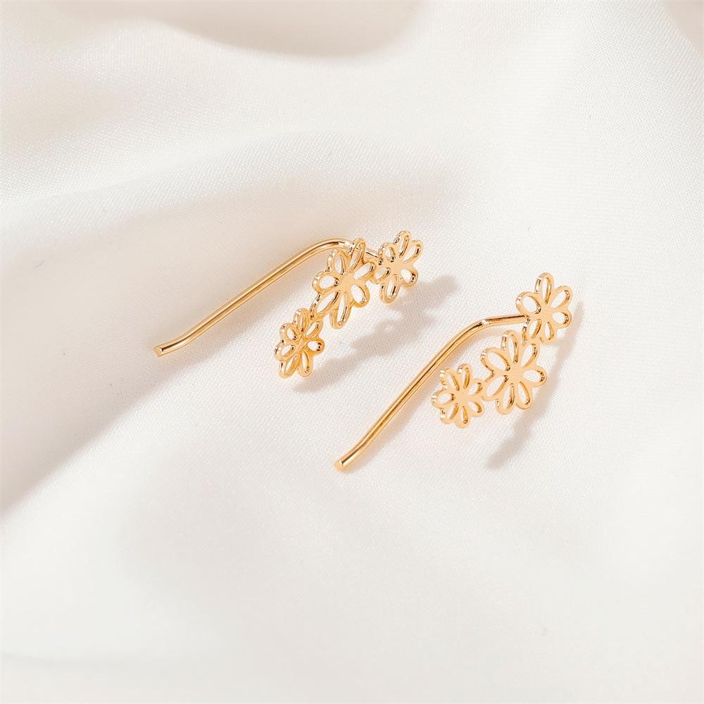 Simple flower earrings cold hollow small flower ear clip female small fresh all-match earrings