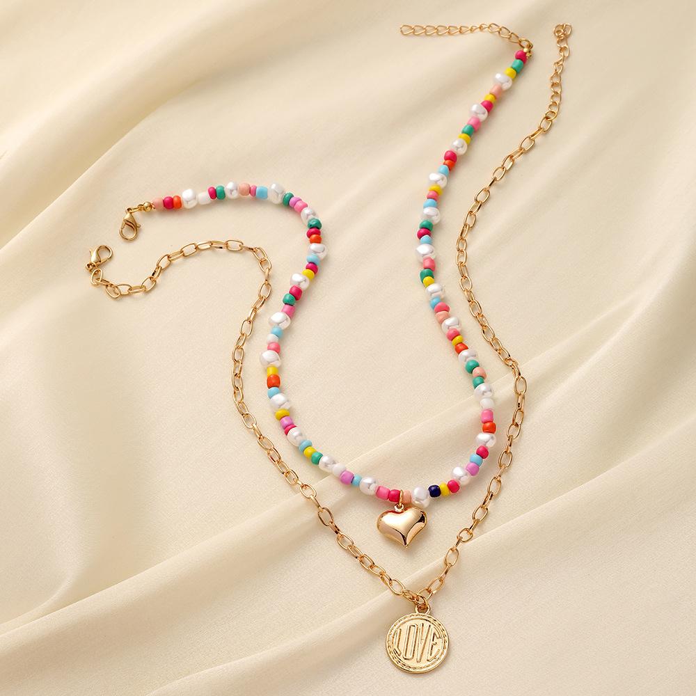 Indifferent double-layer love LOVE coin color rice bead necklace light luxury high-end design fashion ladies chain