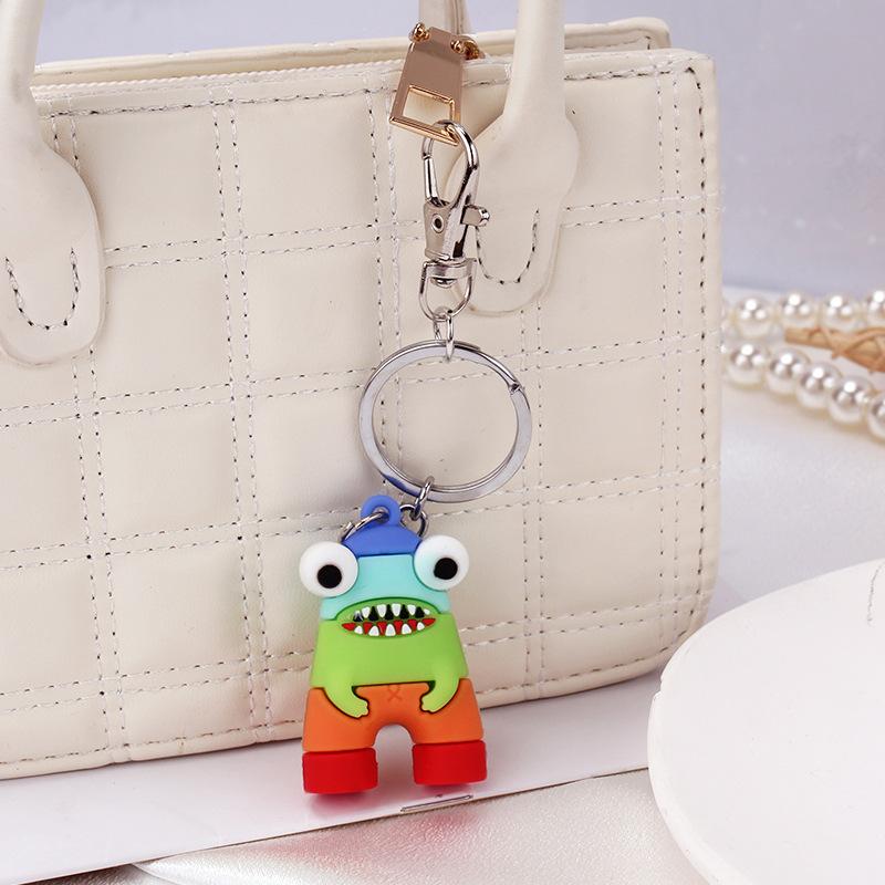 Cartoon color monster key chain creative couple car bag key personality soft pottery pendant