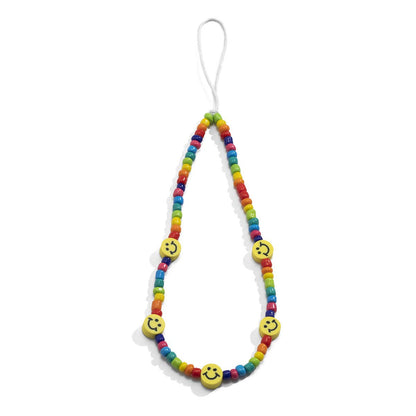 Creative summer multi-letter macaron color mobile phone chain holiday smiling face butterfly flower accessories female