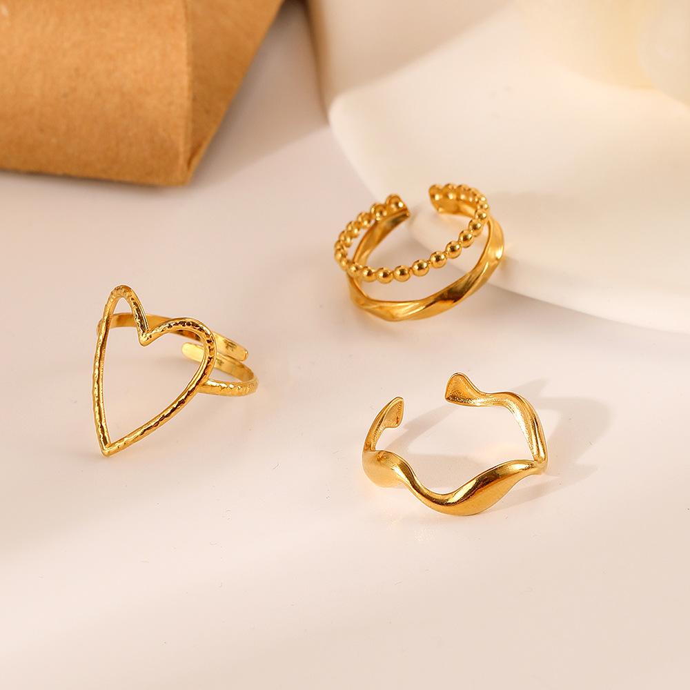 Niche fashion design with personalized ladies stainless steel gold love ladies water wave suit ring