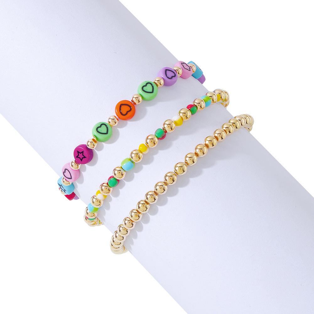 B1623 Internet celebrity elastic hand rope female star smiling face small gold beads beaded bracelet vacation ethnic jewelry