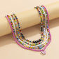 Jewelry mix-and-match butterfly multi-layer tassel rice bead necklace female contrast color pastoral letter flower necklace