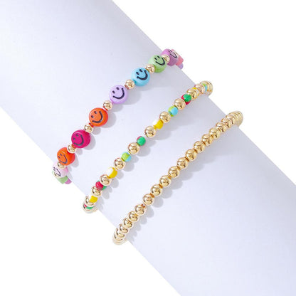 B1623 Internet celebrity elastic hand rope female star smiling face small gold beads beaded bracelet vacation ethnic jewelry