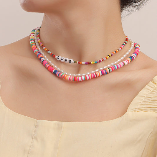 Jewelry Bohemian multi-layer color soft pottery small rice bead necklace female imitation pearl necklace ins