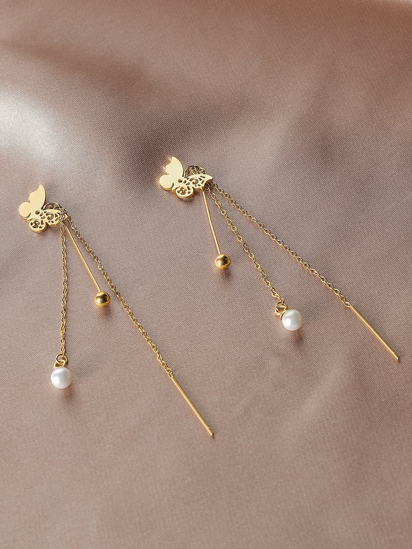 Stainless steel gold-plated color-preserving hollowed-out butterfly pearl ear wire elegant tassel ladies titanium steel gold bead earrings