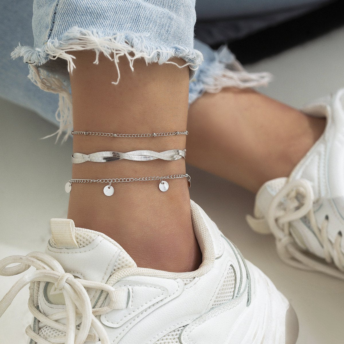 Jewelry niche simple woven snake bone chain anklet female retro metal sequin pendant foot decoration