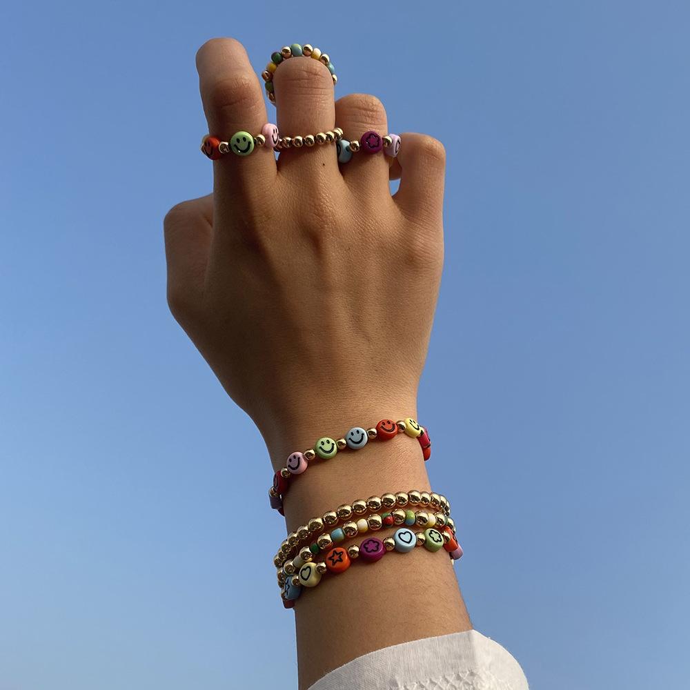 B1623 Internet celebrity elastic hand rope female star smiling face small gold beads beaded bracelet vacation ethnic jewelry