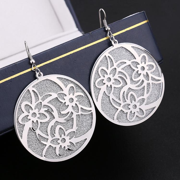 Popular element star with the same round swirling pattern swing earrings fashion frosted earrings direct supply