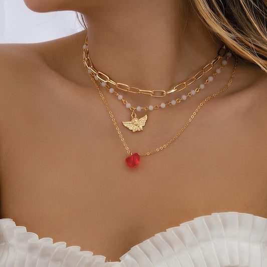 Stacked retro little angel pendant versatile collarbone chain temperament fashion imitation crystal love necklace female