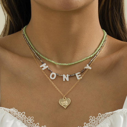 Retro Simple Rice Bead Letter Stacked Necklace Metal Heart Shaped Angel Portrait Clavicle Necklace Female